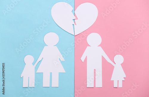 Broken family  divorce. Split paper family  broken heart on blue pink pastel background