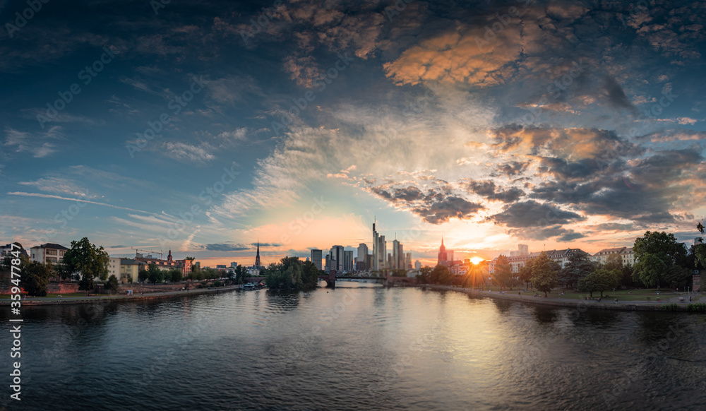 panoramic high deffinition  view of the frankfurt skyline with the setting sun 