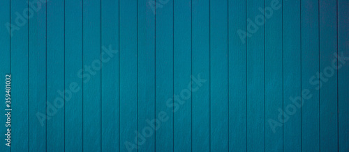 Blue wooden panels pattern or plywood vertical fence textured for material backdrop and background 