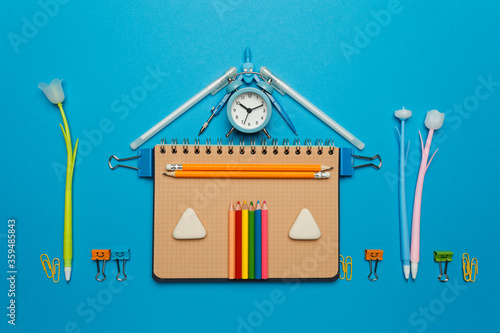School house from stationery set on blue background. Welcome back to learning.
