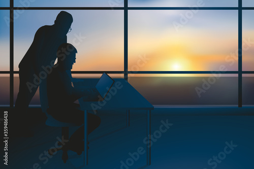 Concept du travail d’équipe en entreprise avec deux collaborateurs qui partagent des informations et mettent leurs compétences en commun sur un projet.