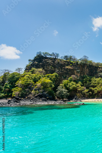The Beautiful view of Sancho Beach from the sea, with turquoise clear water, at Fernando de Noronha Marine National Park, a Unesco World Heritage site, Pernambuco, Brazil