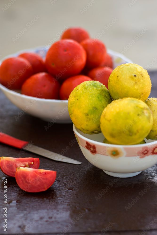 yellow organic lemons in a bowl yellow organic lemons in a bowl