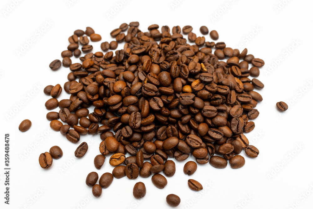 Roasted coffee beans pile isolated on white background. top view Roasted coffee beans pile isolated on white background. top view