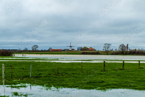 Rural landscape in West Flanders, Belgium near Beveringe and Stavele with flood of the river IJzer

