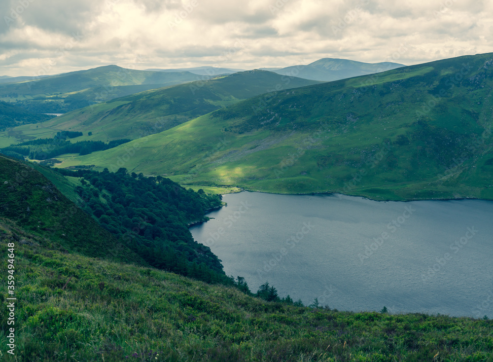 Panoramic view of  The Guinness Lake (Lough Tay) -  a movie and series location, such as Vikings. Close to Dublin City, popular tourist destination.