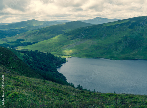 Panoramic view of  The Guinness Lake  Lough Tay  -  a movie and series location  such as Vikings. Close to Dublin City  popular tourist destination.