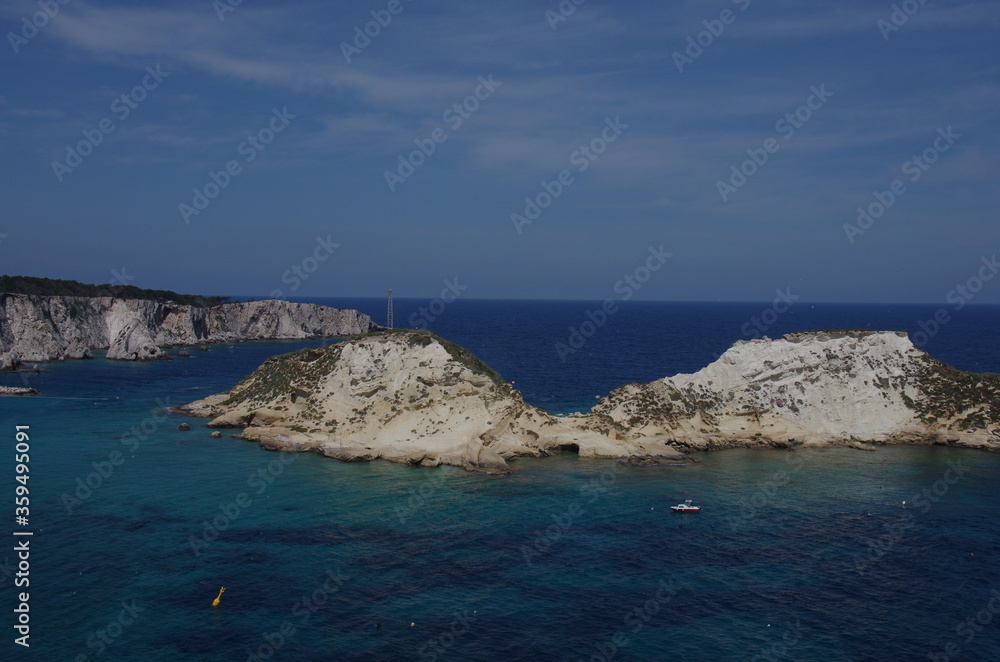 The small island of Cretaccio, of clayey nature and without vegetation, is located between San Domino and San Nicola. Tremiti Islands - Adriatic Sea - Italy The small island of Cretaccio, of clayey nature and without vegetation, is located between San Domino and San Nicola. Tremiti Islands - Adriatic Sea - Italy