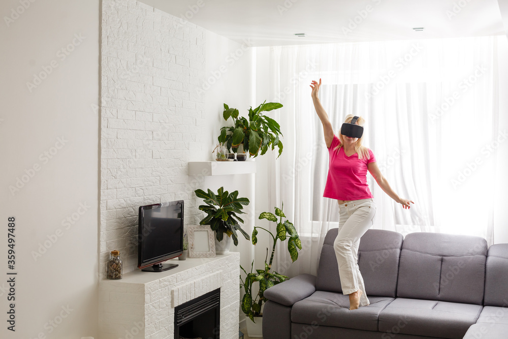 Woman using the virtual reality headset, virtual glasses Woman using the virtual reality headset, virtual glasses