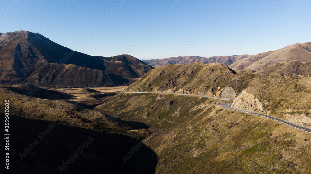 Fototapeta premium Beautiful highway road with mountain in rural on day time.