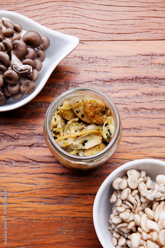 Nutrition concept - Healthy meals in glass jars over wooden background. Homemade mushroom and salad. Healthy food, Diet, Detox, Clean Eating or Vegetarian concept Nutrition concept - Healthy meals in glass jars over wooden background. Homemade mushroom and salad. Healthy food, Diet, Detox, Clean Eating or Vegetarian concept