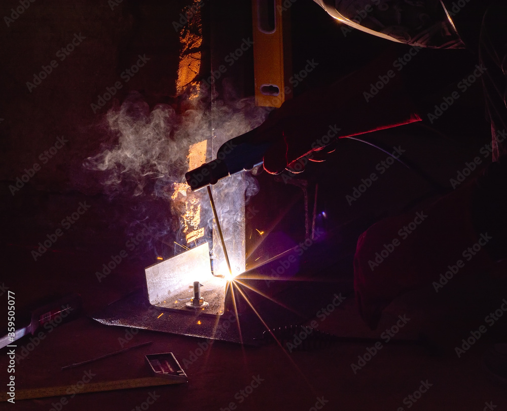 Arc welding of a steel in construction site