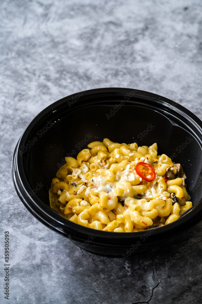 Mac and Cheese, American Style Macaroni Pasta with Cheesy Sauce and Crunchy Breadcrumbs Topping on. Mac and Cheese, American Style Macaroni Pasta with Cheesy Sauce and Crunchy Breadcrumbs Topping on.