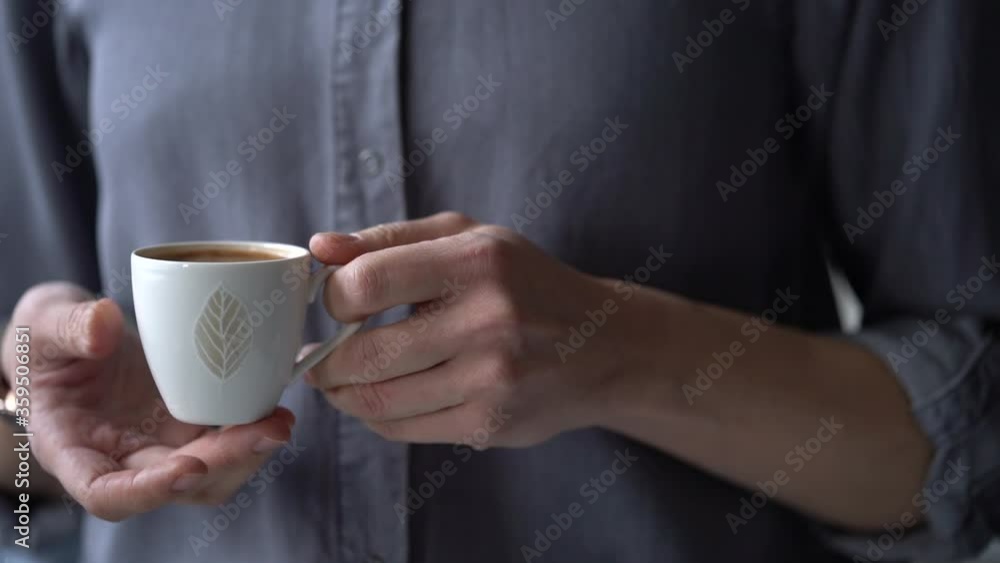 Anonymous woman with cup of fresh coffee Anonymous woman with cup of fresh coffee
