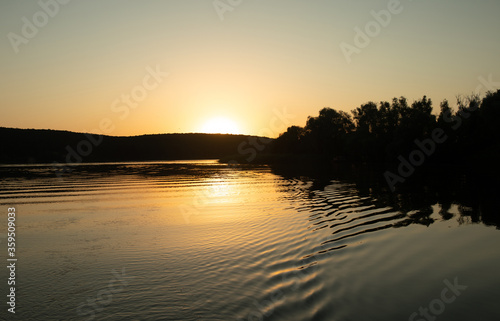 Beautiful sunset reflected in the lake.