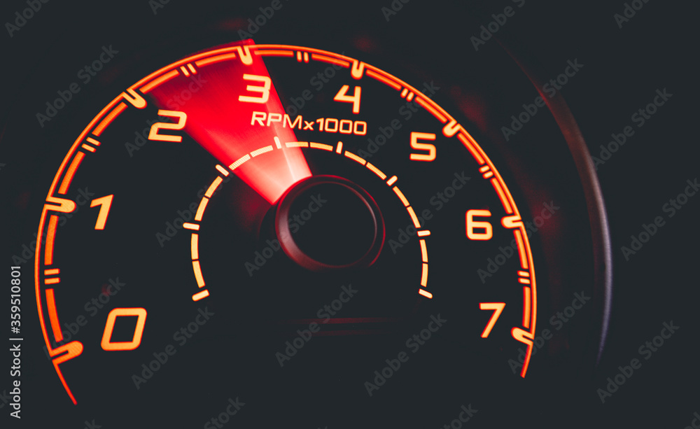 Fototapeta premium Driver's cockpit ; speedometer on dashboard - colorful light in black, copy space for your abstract design 
