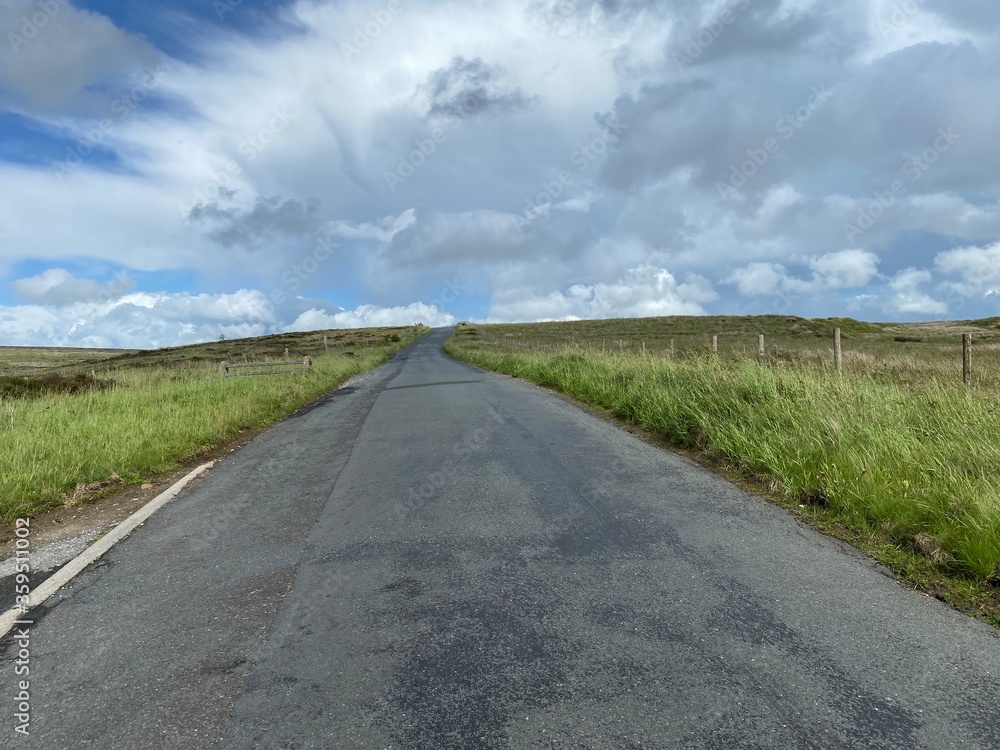 Country road, leading over the moor top, toward Stanbury, Keighley, UK
