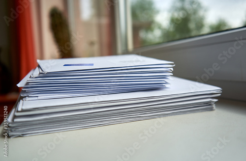 Stack of envelopes near the window