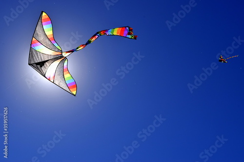 black kite with colorful stripes
