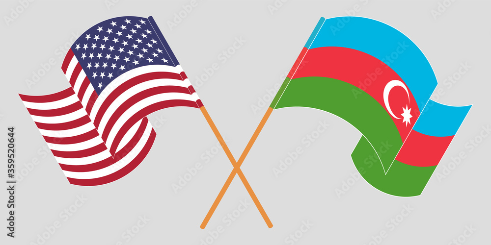 Crossed and waving flags of Azerbaijan and USA