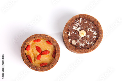 Nutrition concept -Healthy small quiche over white background. Healthy food, Diet, Detox, Clean Eating or Vegetarian concept.
