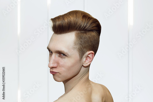 Young ginger guy with pompadour haircut, real photo hair for barbershop old fashioned photo