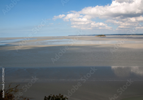 Low tide in the bay in front of Mont Saint Michel in Normandy, France.
