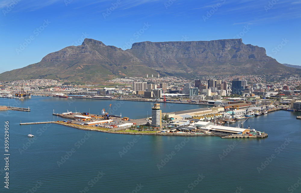 Cape Town, Western Cape / South Africa - 10/14/2013: Aerial photo of Port Control Tower in Table Bay Harbour with Table Mountain in the background