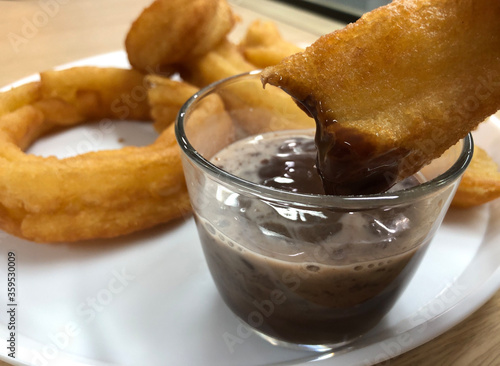 Churros dipped in hot chocolate