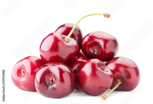 A pile of red sweet cherries on a white background. Isolated