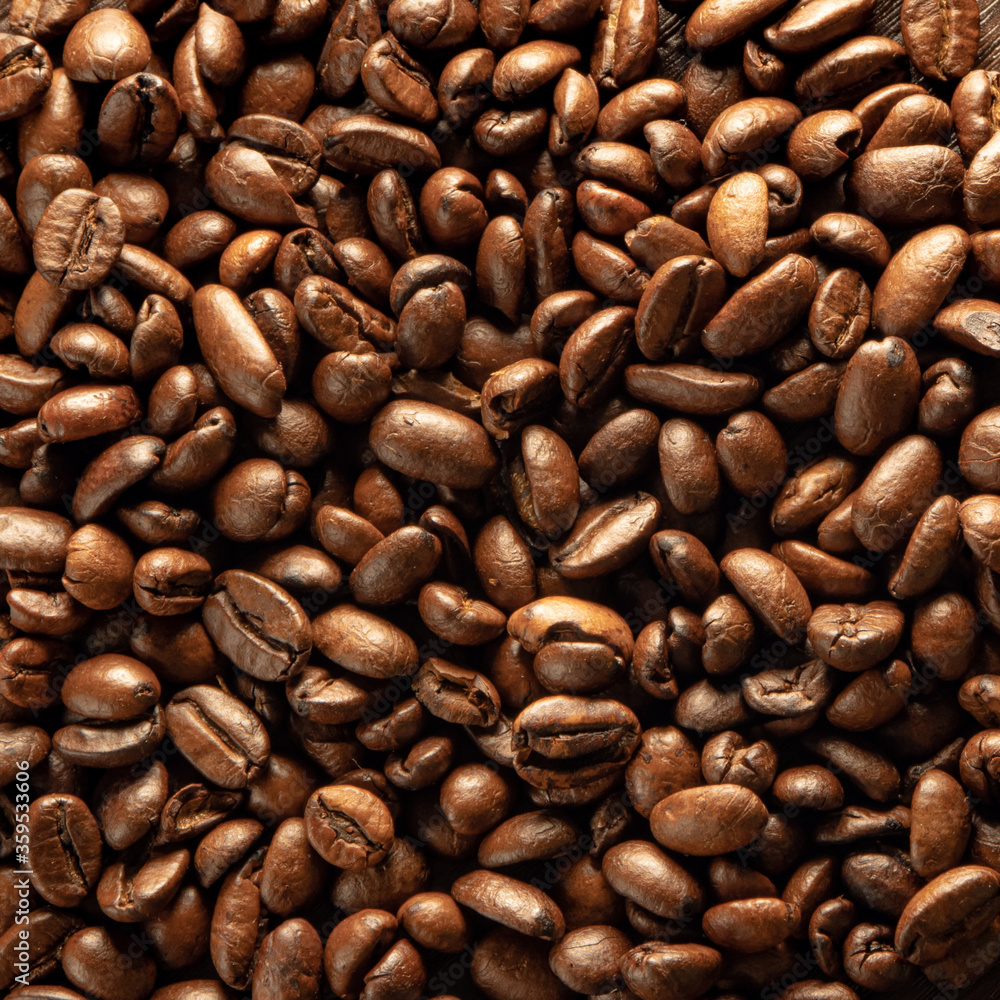 Many coffee beans. Close-up of coffee beans background. Many coffee beans. Close-up of coffee beans background.