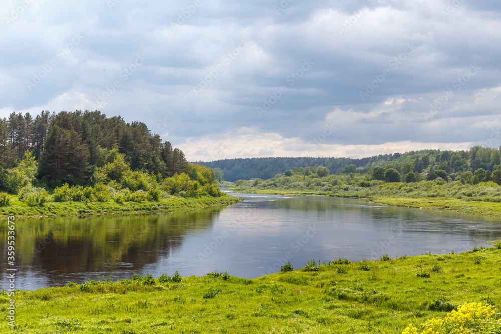 Beautiful summer day by the river, thunderclouds, Kraslava, Latgale, Latvia