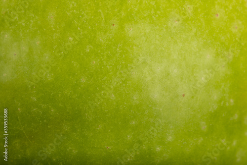 Apple skin surface texture pattern close up detail macro. Abstract background. 