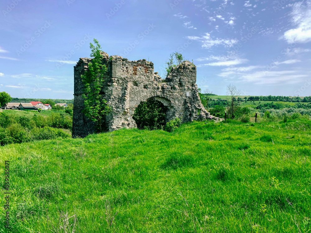 Old ruined abandoned castle on the hill, ruins photo, Ukraine, Sutkivci.