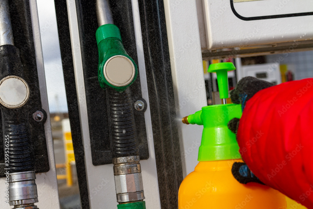 Disinfection. Gas station. Disinfection of refueling guns, columns. Disinfection. Gas station. Disinfection of refueling guns, columns.