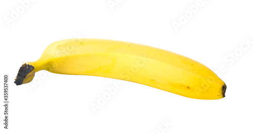 One ripe yellow banana on white background
