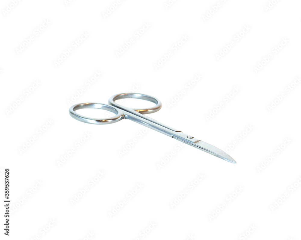 Small nail scissors with metal handle on white background Small nail scissors with metal handle on white background