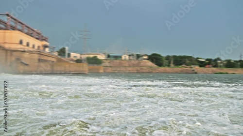 Discharge water from the dam of hydroelectric plant photo