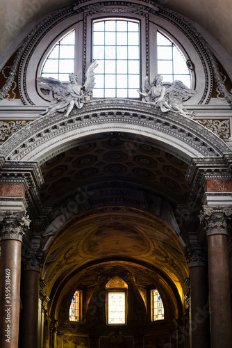 Monumental arch under the dome of a church in Rome