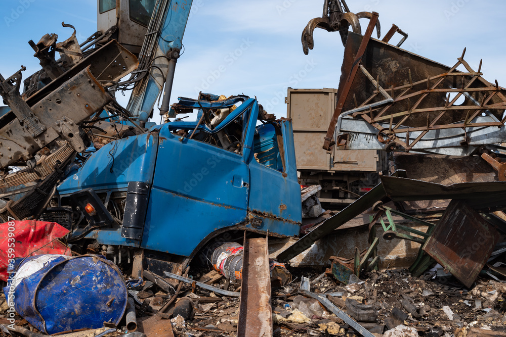 Landfill with iron products. Metal recycling business. Landfill with iron products. Metal recycling business.