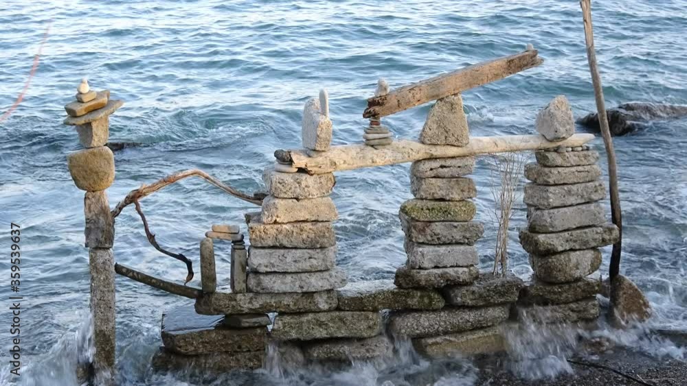 Rock sculptures on shallow lake waters Rock sculptures on shallow lake waters