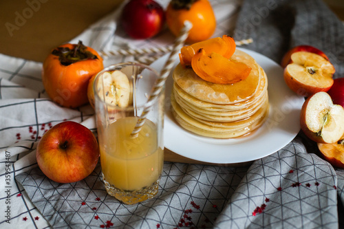 pancakes with honey and fruit juice