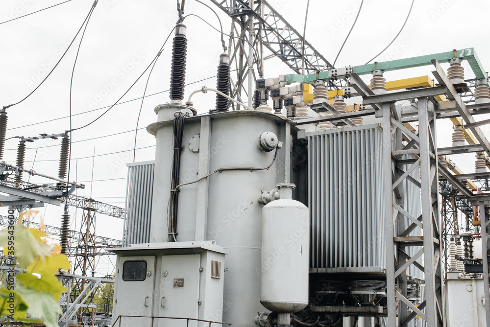 Fototapeta premium Power transformer at the electrical substation. Power engineering. Industry
