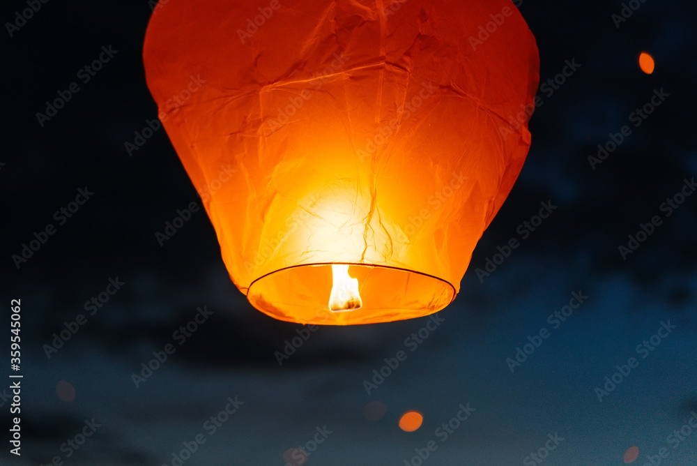 Paper lanterns launched into the sky during the celebration of ...