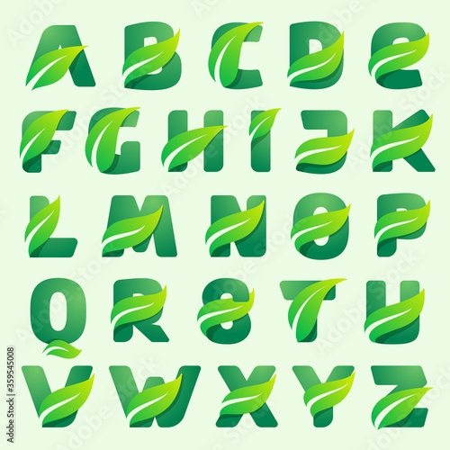 Ecology alphabet with green leaves.