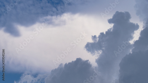 Fototapeta Naklejka Na Ścianę i Meble -  Background of large summer Cumulus clouds