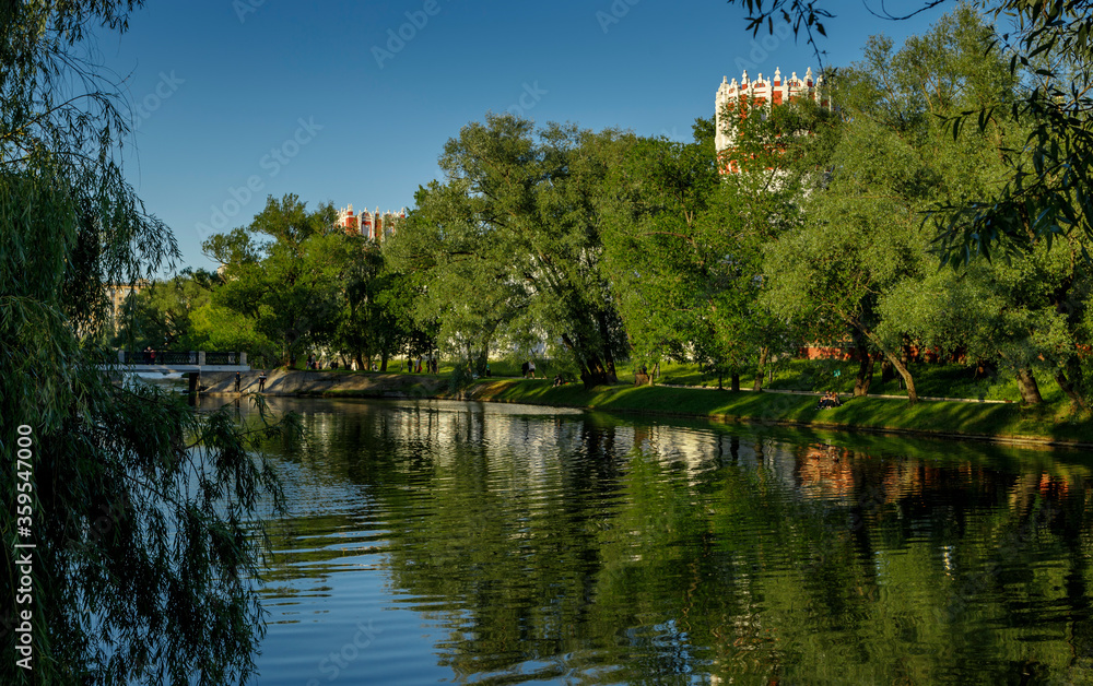 View of the Novodevichy Convent on a clear summer evening. Russia Moscow. View of the Novodevichy Convent on a clear summer evening. Russia Moscow.