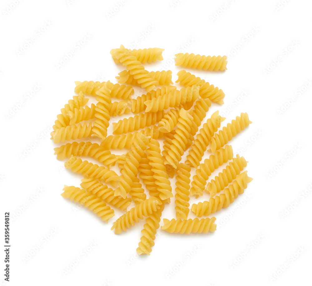 heap of raw fusilli pasta isolated on white background heap of raw fusilli pasta isolated on white background