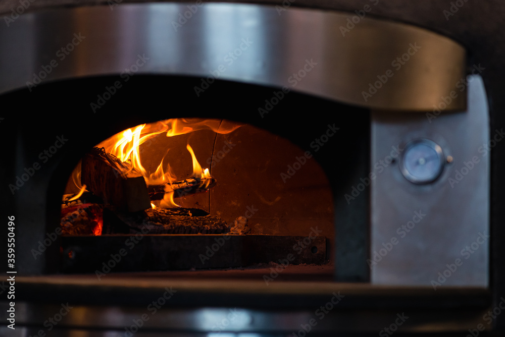 pizza oven stove with burning fire