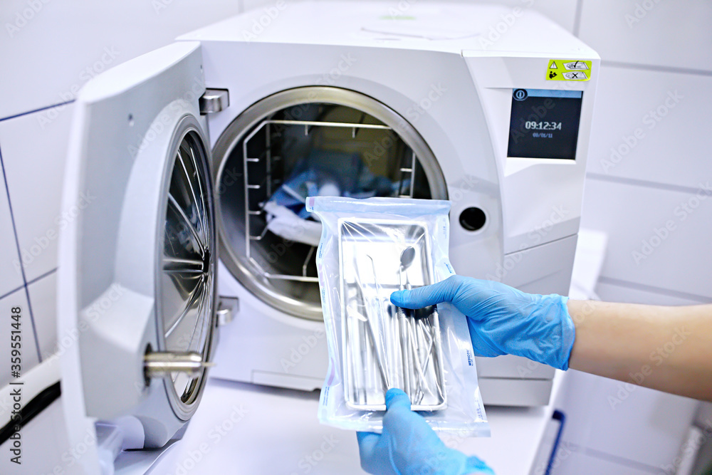 Sterilizing box. Sterilization of instruments. Dentist tools